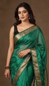Woman In Emerald Silk Saree With Border