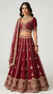Woman In Garnet Red Net Lehenga