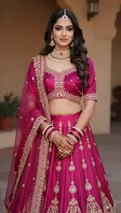 Woman In Magenta Silk Lehenga With Dupatta