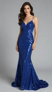 Woman In Royal Blue Mermaid Gown With Sequins