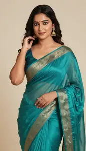 Woman In Sea Green Silk Saree