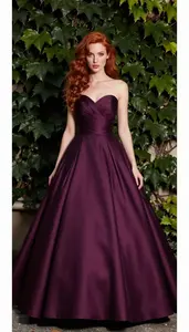 Glamorous Woman In Plum Ball Gown