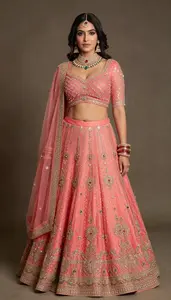 Woman In Coral Net Lehenga
