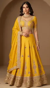 Woman In Marigold Georgette Lehenga With Zari