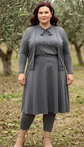 Body Positive Plus Size Flowing Blouse With Tie Neck Paired With A Line Midi