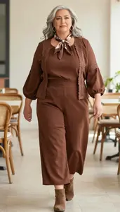 Body Positive Plus Size Flowing Blouse With Tie Neck Paired With High Waisted