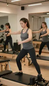Pilates Instructor Leading A Zumba Dance In A Dance Fitness Studio At