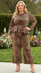 Plus Size Peplum Hem Top Paired With High Waisted Wide Leg Trousers And Moto