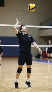 Volleyball Coach Spiking A Volleyball On On A Volleyball Court In Professional