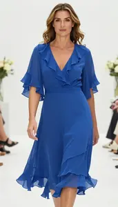 Fashion Forward Royal Blue Chiffon Ruffle Evening Dress Stock Photo
