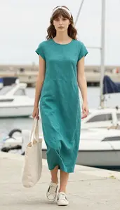 Fashion Forward Teal Linen Blend Dress Stock Photo