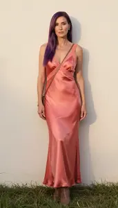 Mature Woman Stunning Woman In Coral Satin Maxi Dress