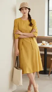 Pale Skinned Woman Woman In Late 30s In Mustard Yellow Organdy Dress Fashion