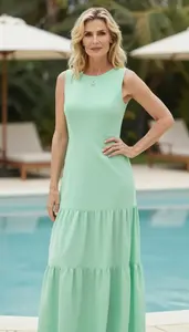 Sophisticated Woman In Tiered Maxi Dress Stock Photo
