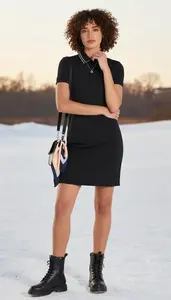 Woman In Late 30s Woman In Late 30s In Black Golf Dress Fashion Stock Photo