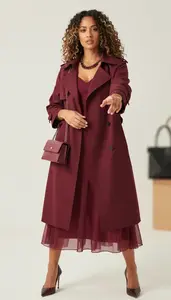 Fashion Forward Burgundy Organza Overlay Gown Stock Photo