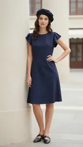Fashion Forward Navy Blue Flutter Sleeve Casual Dress Stock Photo
