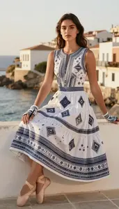 Fashion Forward White Ethnic Print Dress Stock Photo