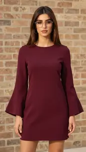 Fashionable Woman In Bell Sleeve Casual Dress Stock Photo