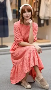 Graceful Woman In Ethnic Print Dress Stock Photo