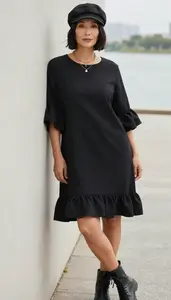 Mature Woman Well Dressed Woman In Black Raw Hem Dress