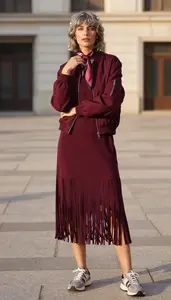 Modern Woman In Fringe Midi Dress Stock Photo