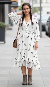 Nordic Woman Woman In Mid 30s In White Bird Print Dress Fashion Stock Photo