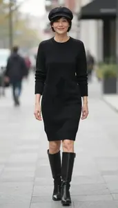 Poised Mature Woman Woman In Intarsia Sweater Dress