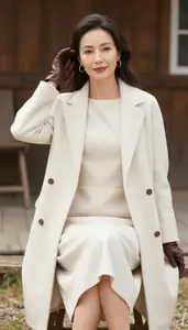 Scandinavian Woman Woman In 40s In Cream Modest Shirt Dress Fashion Stock Photo