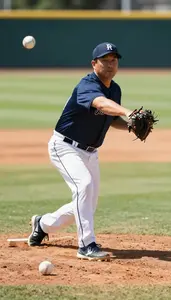 Baseball Coach Pitching A Baseball On On A Baseball Diamond In Professional