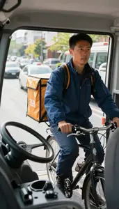 Bicycle Courier Delivering Mail On A Inside A Taxi In City Traffic In