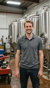Brewer Brewing Beer In A In A Craft Brewery Production Room At Professional