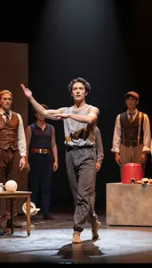 Contemporary Dancer Directing An Opera Production On An Improv Theater Stage