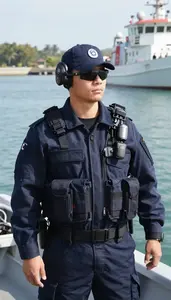 Customs Officer Enforcing Maritime Laws On On A Coast Guard Patrol Boat At