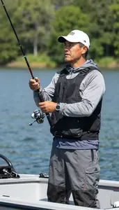 Fishing Instructor Fishing From A Boat On A Lake Fishing Spot At Professional