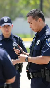 Private Investigator Collecting Evidence At A At An Outdoor Crime Scene