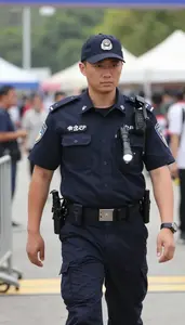 Security Manager Patrolling A Border Crossing At A Large Public Event Venue