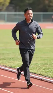 Track And Field Running On A Track On A Running Trail At Workplace