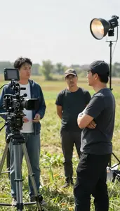 Film Director Directing Actors On A In A Photography Studio At Workplace