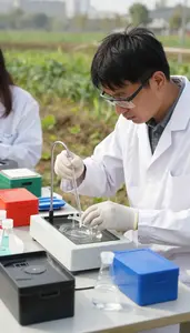 Hydrologist Testing Water Samples In In A Field Water Testing Station In