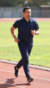 Track And Field Running On A Track On A Track And Field Stadium At Professional