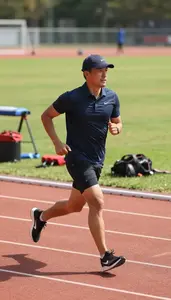 Track And Field Running On A Track On A Track And Field Stadium At Workplace
