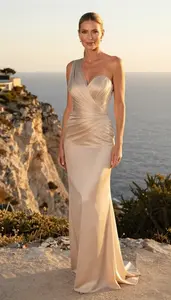 Beautiful Mediterranean Woman With Blonde Sleek Ponytail In Evening Dress Sunset