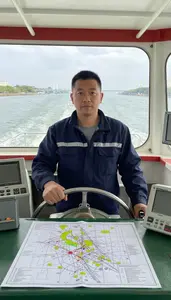 Boat Captain Steering Ferry Across In A Ship Bridge Navigation Area In