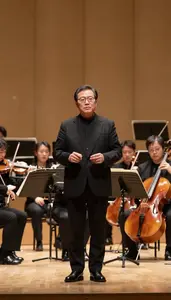 Composer Announcing Live Event In An Orchestra Concert Hall In Professional