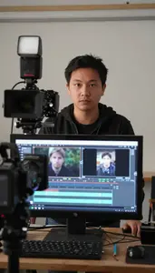 Documentary Filmmaker Editing Video Footage On A Film Movie Set In Professional