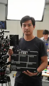 Film Editor Managing Film Production On A Film Movie Set In Professional Setting