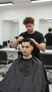 Hair Stylist Giving Classic Barber In A Cosmetology Salon Station In