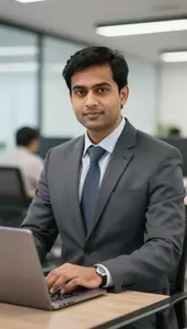 It Manager At Desk In Modern Office