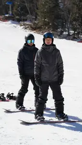 Snowboard Instructor Instructing Snowboarding Slope On A Ski Slope Training Area